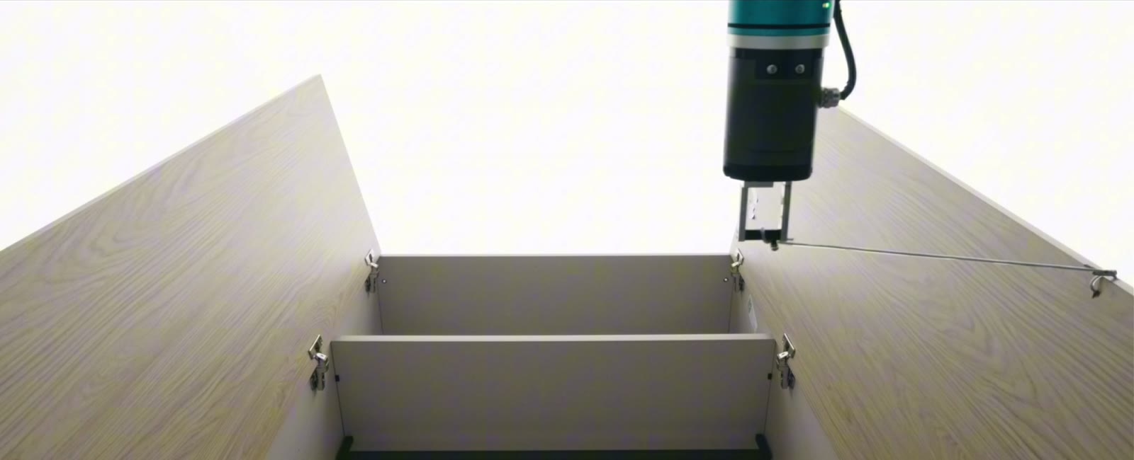 Robotic durability test on a cabinet